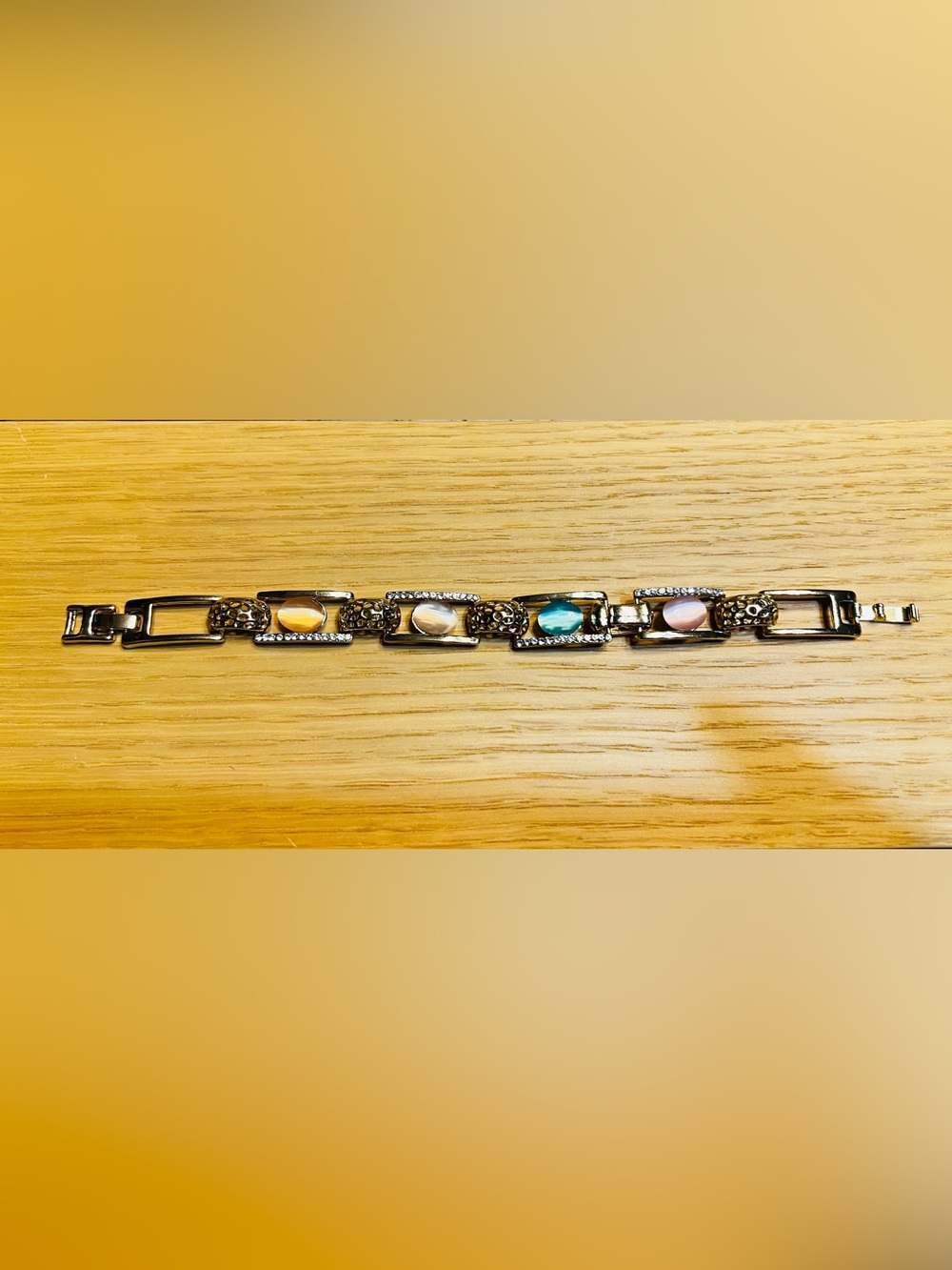Gold-Tone Bracelet with green and Cream Cabochons